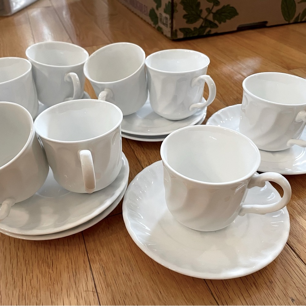 Set of 8 white China teacups & saucer set